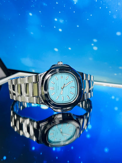 Patek Philippe Silver Chain Watch With Aqua Dial And Date
